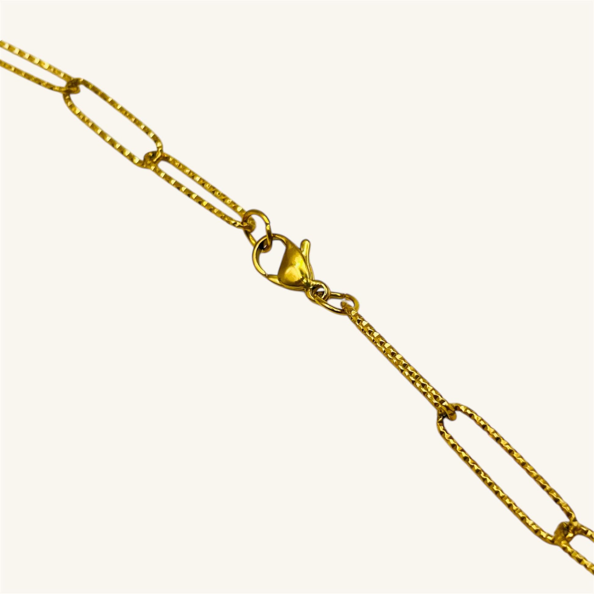 Carved Horn Pendant Necklace – Gold Paperclip Chain